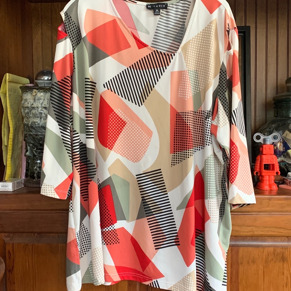 N‎ touch woman’s small open shoulder top. Worn about 5x